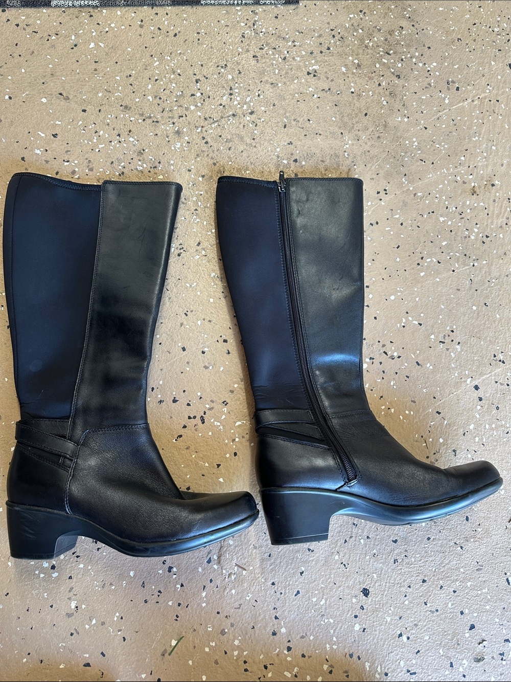 Clark’s black riding boots
